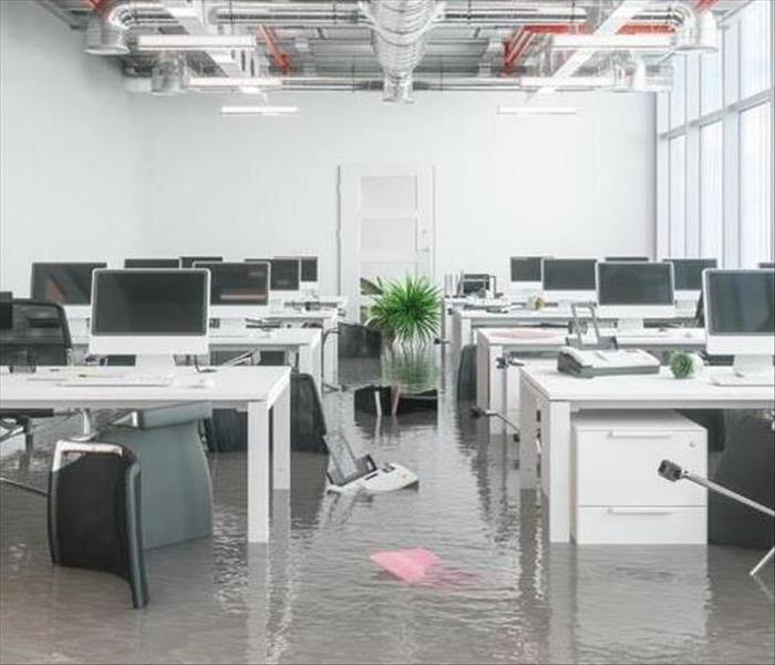 inside of a commercial office with standing water 