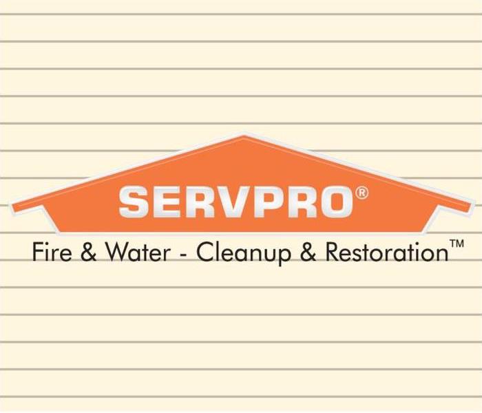 Notebook paper lines behind a SERVPRO logo.